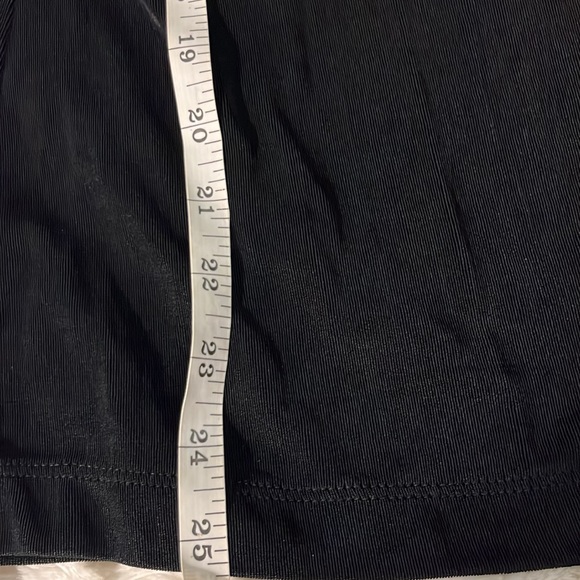 Chico’s Travelers black top. Red ruffle hem, neck line. Size 2. Slits in sleeve - Picture 7 of 7